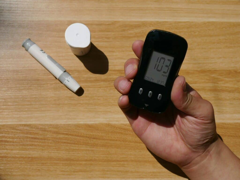Glucose testing machine, testing strips and lancet device, to show diabetes as an example, of how changes to routine can effect physical health during the holidays.